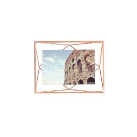 <p><span style="font-size: small;"><strong>UMBRA Рамка за снимки “PRISMA“ <br />• </strong></span><strong>Цвят:</strong> мед <br />• <strong>Размер на рамката:</strong> 15,3 x 20,3 x 7,6 cm<br />• <strong>Размер на снимката:</strong> 10 х 15 см<br /> • <strong>Материал:</strong> метал<br /><strong>Производител: UMBRA / Канада</strong><br /> <em><strong>DESIGN: SUNG WOOK PARK</strong></em></p><br />Марка: Umbra HK Limited <br />Модел: UMBRA 313016-880<br />Доставка: 2-4 работни дни<br />Гаранция: 2 години