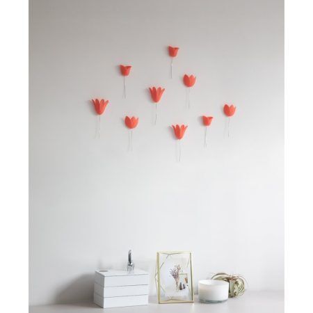 <p><span style="font-size: small;"><strong>UMBRA Комплект 3D декорация за стена “BLOOMER“  </strong></span><br /><span style="font-size: small;"><strong>• </strong></span><strong>Цвят: </strong>корал<br />• <strong>Ефект 3D<br />• Сет от 9 бр формовани цветя с телени стебла</strong><br />•<strong> Закрепване за стена (с включени двойнолепящи лепенки)</strong><br />• <strong>Размер:</strong> 15,9 x 7,2 х 5,1 cм<br />• <strong>Размер на опаковката:</strong> 28 х 23 х 5 см<br />• <strong>Тегло:</strong> 0,100 кг<br />• <strong>Материал:</strong> пластмаса<br /><strong>Производител: UMBRA / Канада<br /></strong><em><strong>DESIGN: ADRIENNA MATZEG & MARION LANKTREE</strong></em></p><br />Марка: Umbra HK Limited <br />Модел: UMBRA 1012968-180<br />Доставка: 2-4 работни дни<br />Гаранция: 2 години