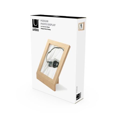 <p><strong>UMBRA Рамка за снимки “PODIUM“ - цвят натурално дърво - 13х18 см.</strong><br /><span><strong>• </strong></span><strong>Цвят:</strong><span> дърво</span><br /><span>• </span><strong>Размер на рамката:</strong><span> 16 x 13 x 26 см</span><br /><span>• </span><strong>Размер на снимката:</strong><span> 13 х 18 см.</span><br /><span>• </span><strong>Размер на опаковката:</strong><span> 19 х 5 х 26 см</span><br /><span>• </span><strong>Тегло:</strong><span> 0,400 кг</span><br /><span>• </span><strong>Материал:</strong><span> Ясен, стъкло</span><br /><strong>Производител: UMBRA / Канада</strong><br /><em><strong>DESIGN: HENRY HUANG</strong></em></p><br />Марка: Umbra HK Limited <br />Модел: UMBRA 1016772-390<br />Доставка: 2-4 работни дни<br />Гаранция: 2 години