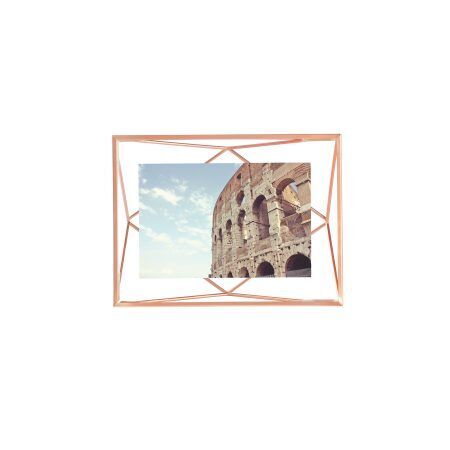 <p><span style="font-size: small;"><strong>UMBRA Рамка за снимки “PRISMA“ <br />• </strong></span><strong>Цвят:</strong> мед <br />• <strong>Размер на рамката:</strong> 15,3 x 20,3 x 7,6 cm<br />• <strong>Размер на снимката:</strong> 10 х 15 см<br /> • <strong>Материал:</strong> метал<br /><strong>Производител: UMBRA / Канада</strong><br /> <em><strong>DESIGN: SUNG WOOK PARK</strong></em></p><br />Марка: Umbra HK Limited <br />Модел: UMBRA 313016-880<br />Доставка: 2-4 работни дни<br />Гаранция: 2 години