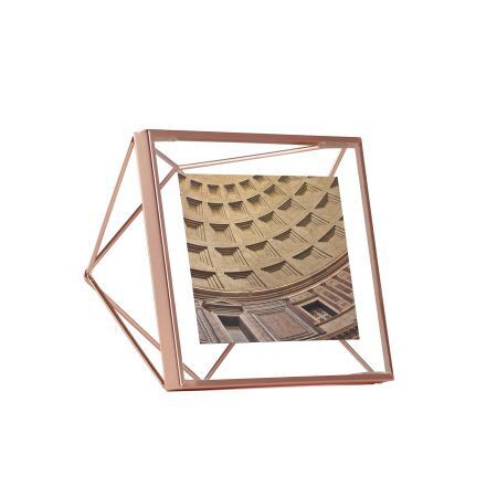 <p><span style="font-size: small;"><strong>UMBRA Рамка за снимки “PRISMA“ <br />• </strong></span><strong>Цвят:</strong> мед<br />• <strong>Размер на рамката:</strong> 15,3 x 15,3 x 7,6 cm<br />• <strong>Размер на снимката:</strong> 10 х 10 см<br /> • <strong>Материал:</strong> метал<br /><strong>Производител: UMBRA / Канада</strong><br /> <em><strong>DESIGN: SUNG WOOK PARK</strong></em></p><br />Марка: Umbra HK Limited <br />Модел: UMBRA 313017-880<br />Доставка: 2-4 работни дни<br />Гаранция: 2 години
