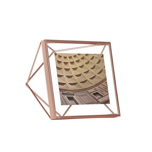 <p><span style="font-size: small;"><strong>UMBRA Рамка за снимки “PRISMA“ <br />• </strong></span><strong>Цвят:</strong> мед<br />• <strong>Размер на рамката:</strong> 15,3 x 15,3 x 7,6 cm<br />• <strong>Размер на снимката:</strong> 10 х 10 см<br /> • <strong>Материал:</strong> метал<br /><strong>Производител: UMBRA / Канада</strong><br /> <em><strong>DESIGN: SUNG WOOK PARK</strong></em></p><br />Марка: Umbra HK Limited <br />Модел: UMBRA 313017-880<br />Доставка: 2-4 работни дни<br />Гаранция: 2 години