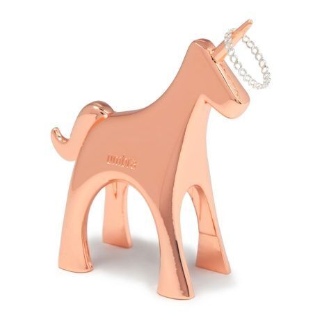 <p><strong>UMBRA Поставка за пръстени “ANIGRAM UNICORN“ - еднорог  <br /></strong><strong>• Цвят: </strong>мед<br />• <strong>Размери: </strong>7 х 3 х 8 см<br />• <strong>Материал: </strong>Метал<br /><strong>Производител: UMBRA / Канада<br /></strong><strong><em>Design: Sung wook Park</em></strong></p><br />Марка: Umbra HK Limited <br />Модел: UMBRA 1012672-880<br />Доставка: 2-4 работни дни<br />Гаранция: 2 години
